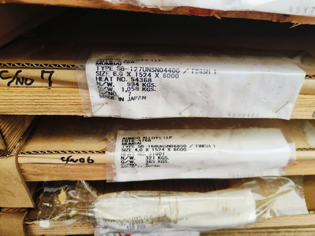 Packing labels for Monel 400 and Alloy 600 plates showing type, size, heat number and weights